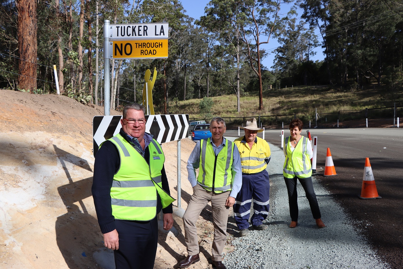 Resized scott buchholz and councillors inspecting upgrade works on beechmont road